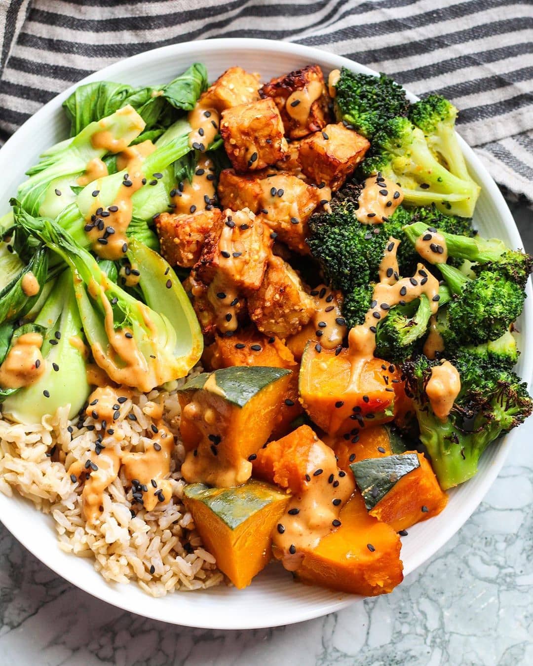 Bowl of Baked Tempeh with Peanut Sauc
