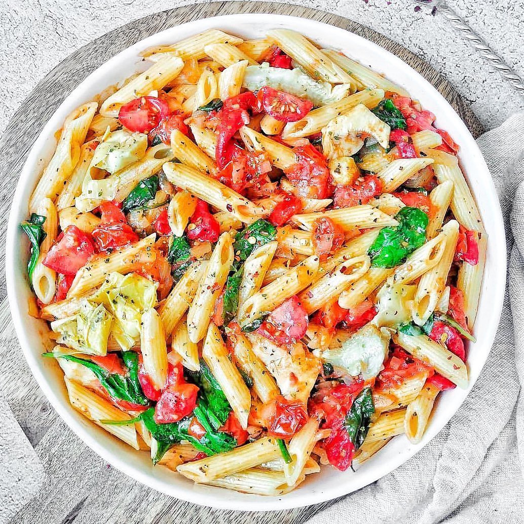 Penne with Artichokes, Roasted Peppers and Spinach in White Wine Sauce