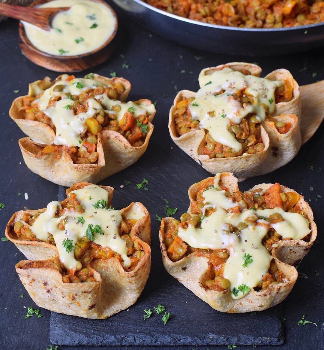 Yummy Taco Cups Stuffed with Lentils, Veggies, and Vegan Cheese Sauce