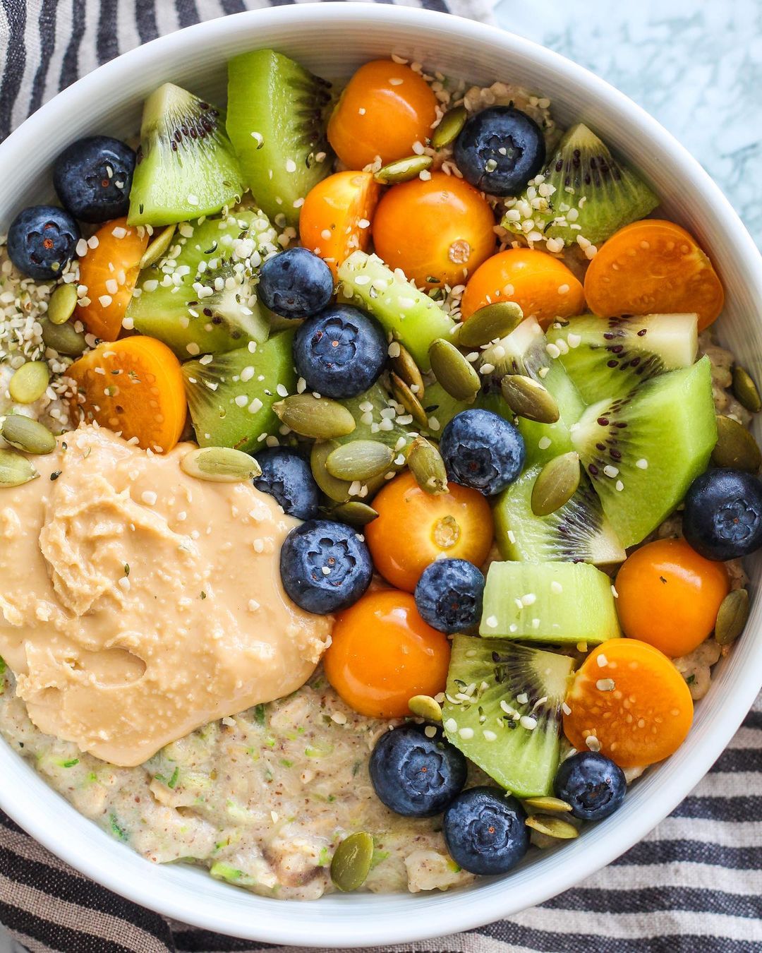 Zucchini Oats, Gooseberries, Blueberries, Kiwi, Peanut Butter, Pepitas and Hemp Hearts