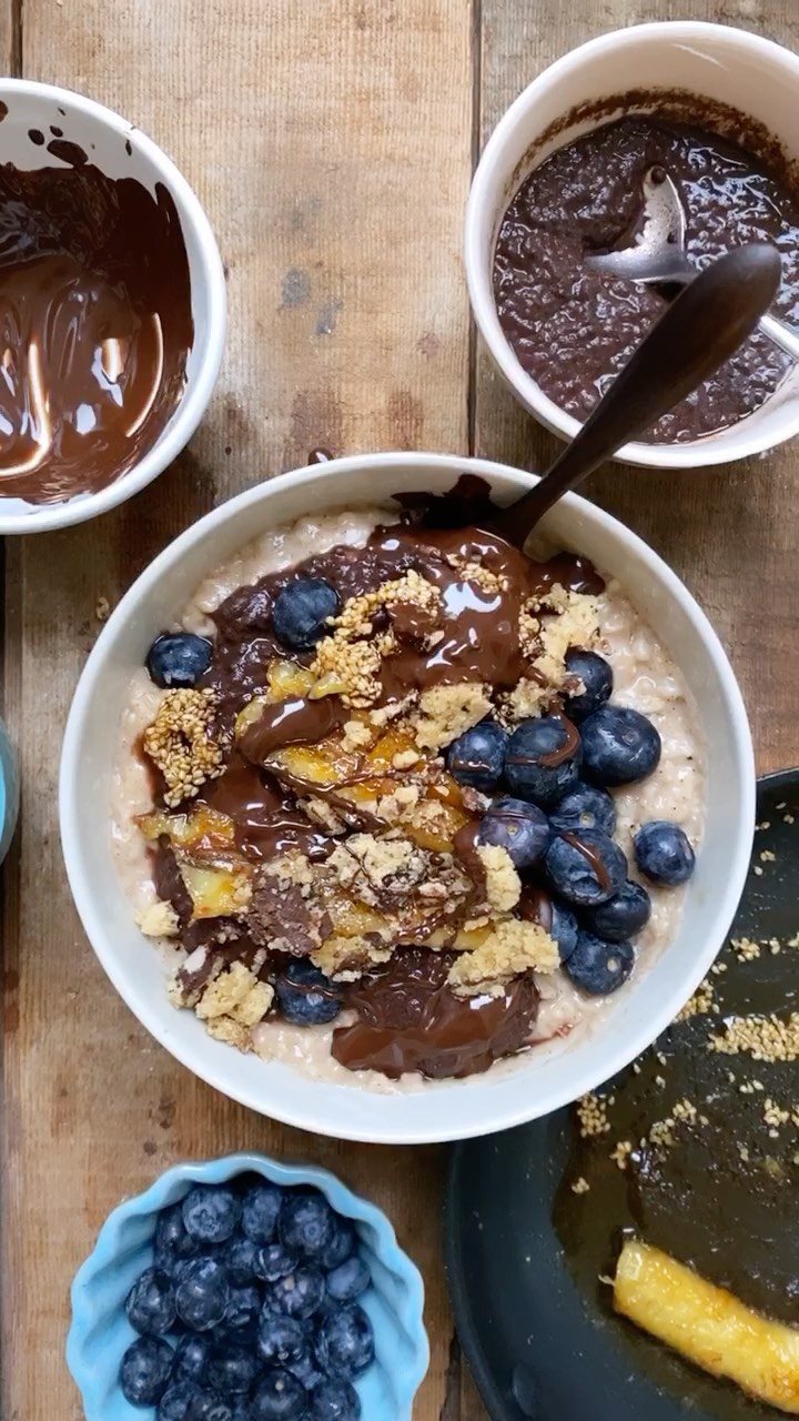 Bowl of Cinnamon and Coconut Yoghurt Porridge with Every Topping