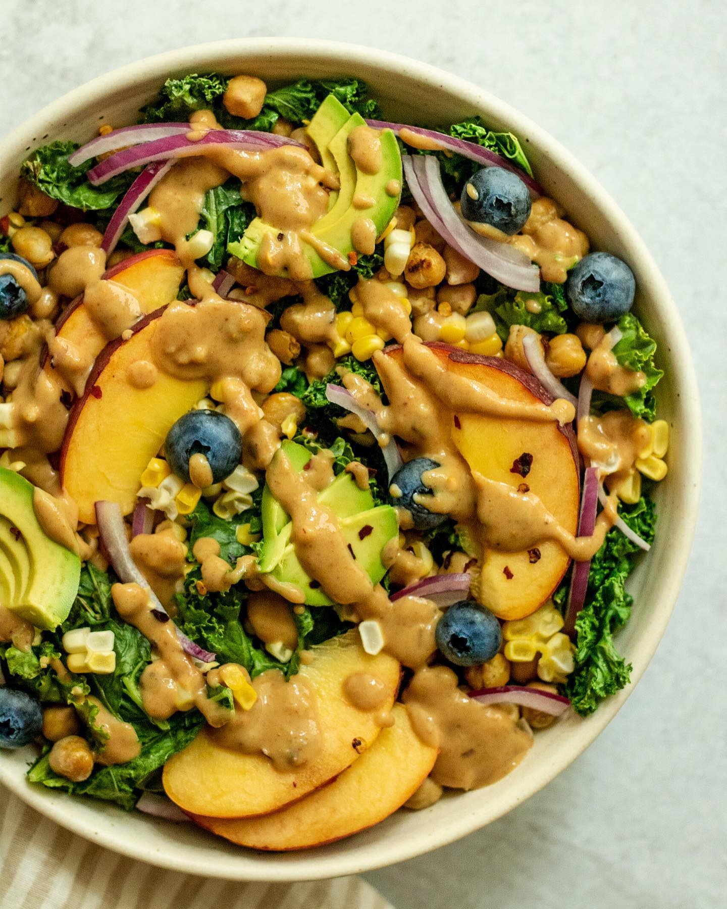 Summer Peach & Blueberry Salad with Sweet Cashew Mustard Dressing