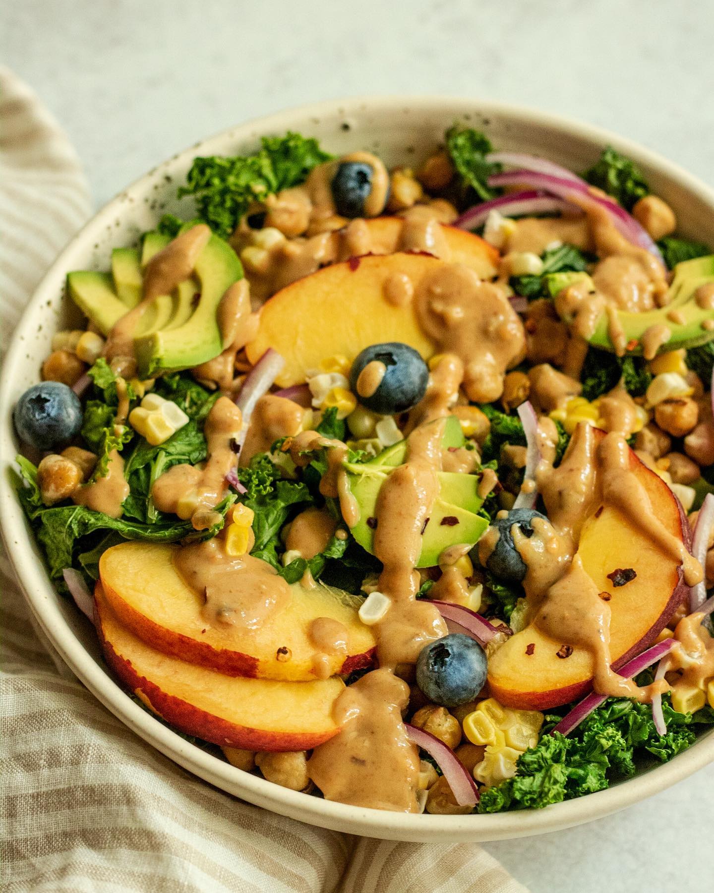 Summer Peach & Blueberry Salad with Sweet Cashew Mustard Dressing