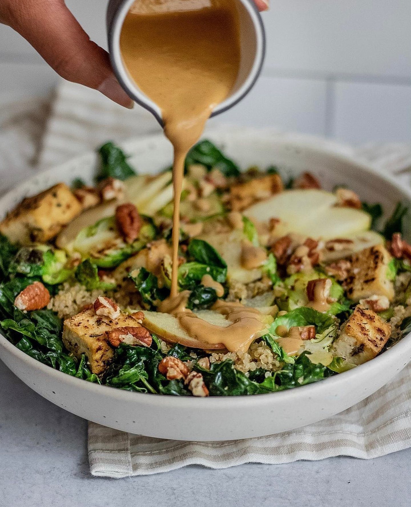 Chopped Kale Salad with Pan-Seared Tofu and Miso Ginger Tahini Dressing