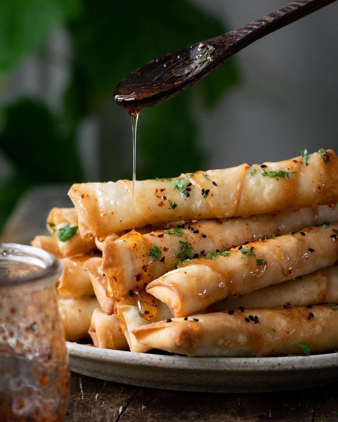 Crispy Vegan Cheese & Herb Rolls with Aleppo Chili Infused Agave Syrup