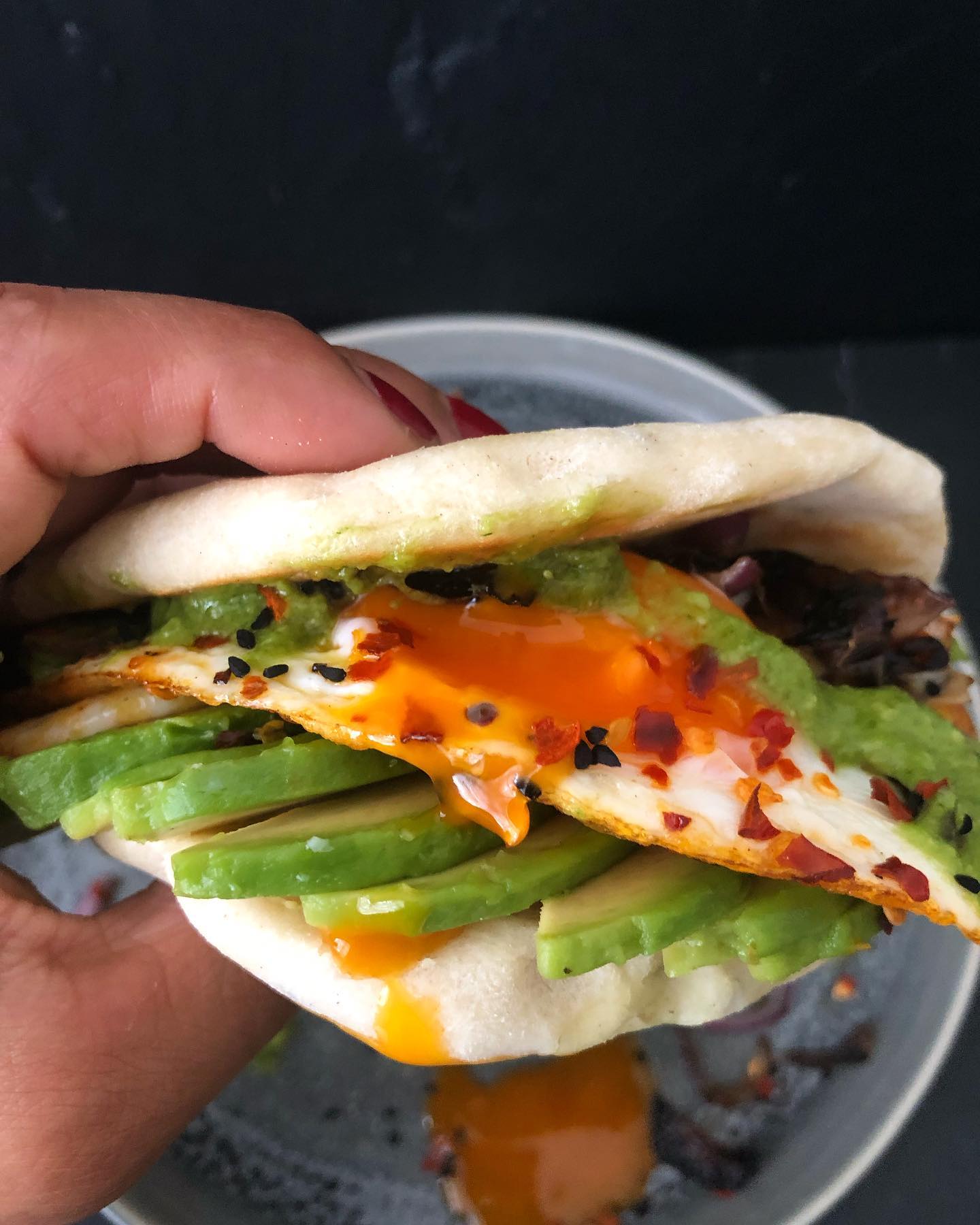 Breakfast Naan with Avocado, Chilli Oil Fried Egg, Crispy Fried Onion, and Green Chutney