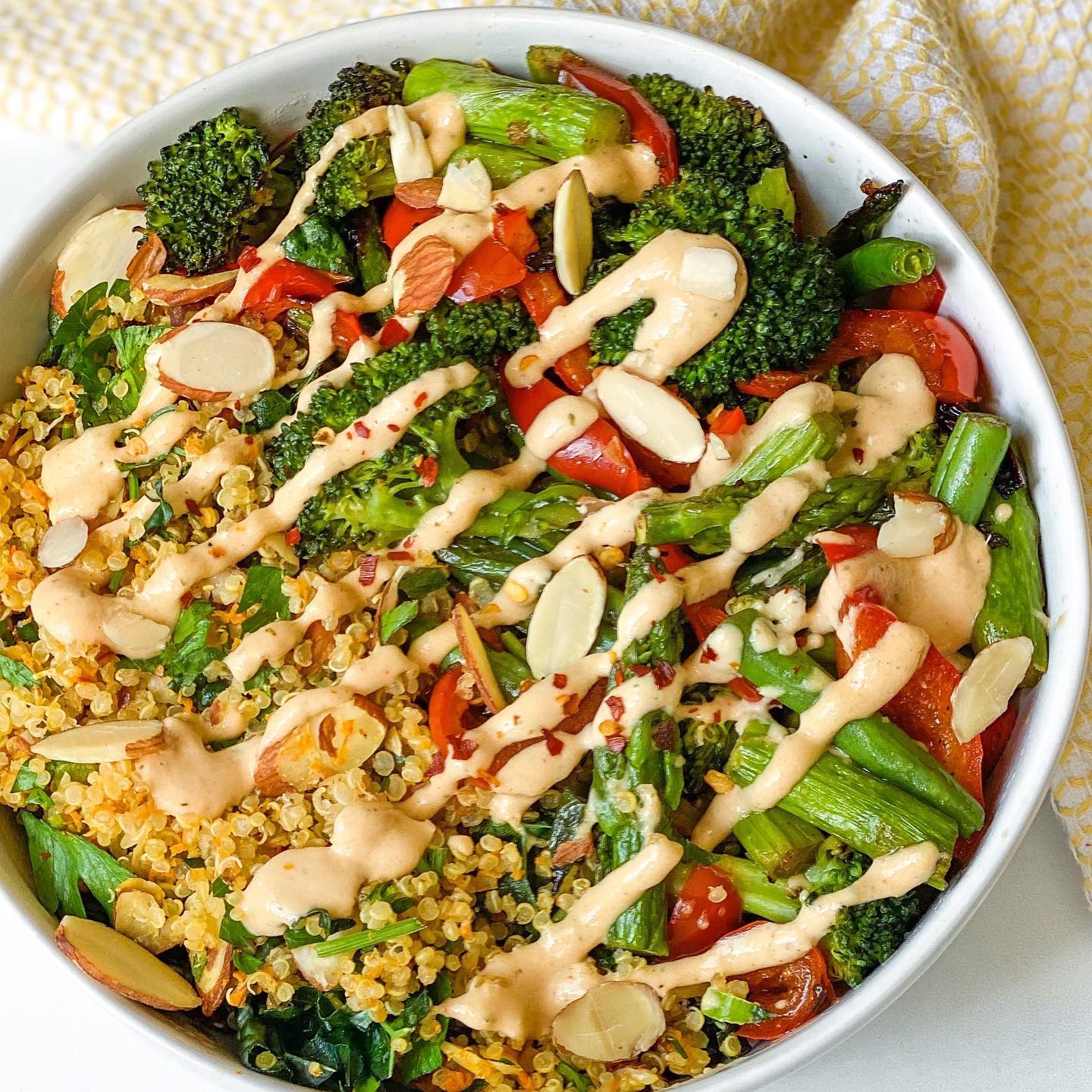 Flavorful Roasted Veggie Quinoa Bowl with Spicy Lemon Herb Tahini