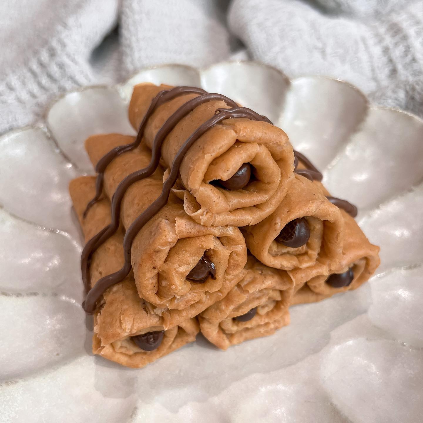 Pumpkin Protein Crepes with Chocolate Drizzle and Stuffed with Chocolate Finger Biscuits