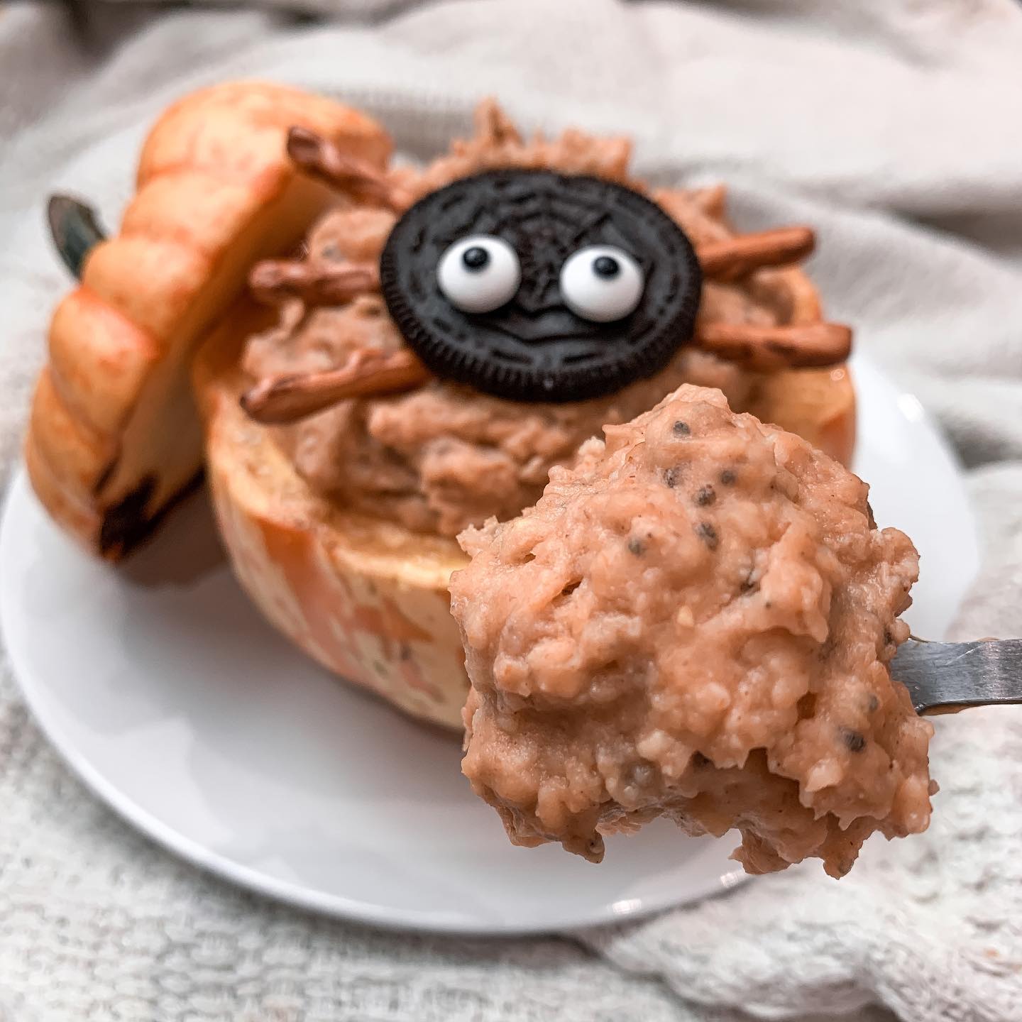 Pumpkin Oatmeal with Spooky Oreo and Pretzel Toppings