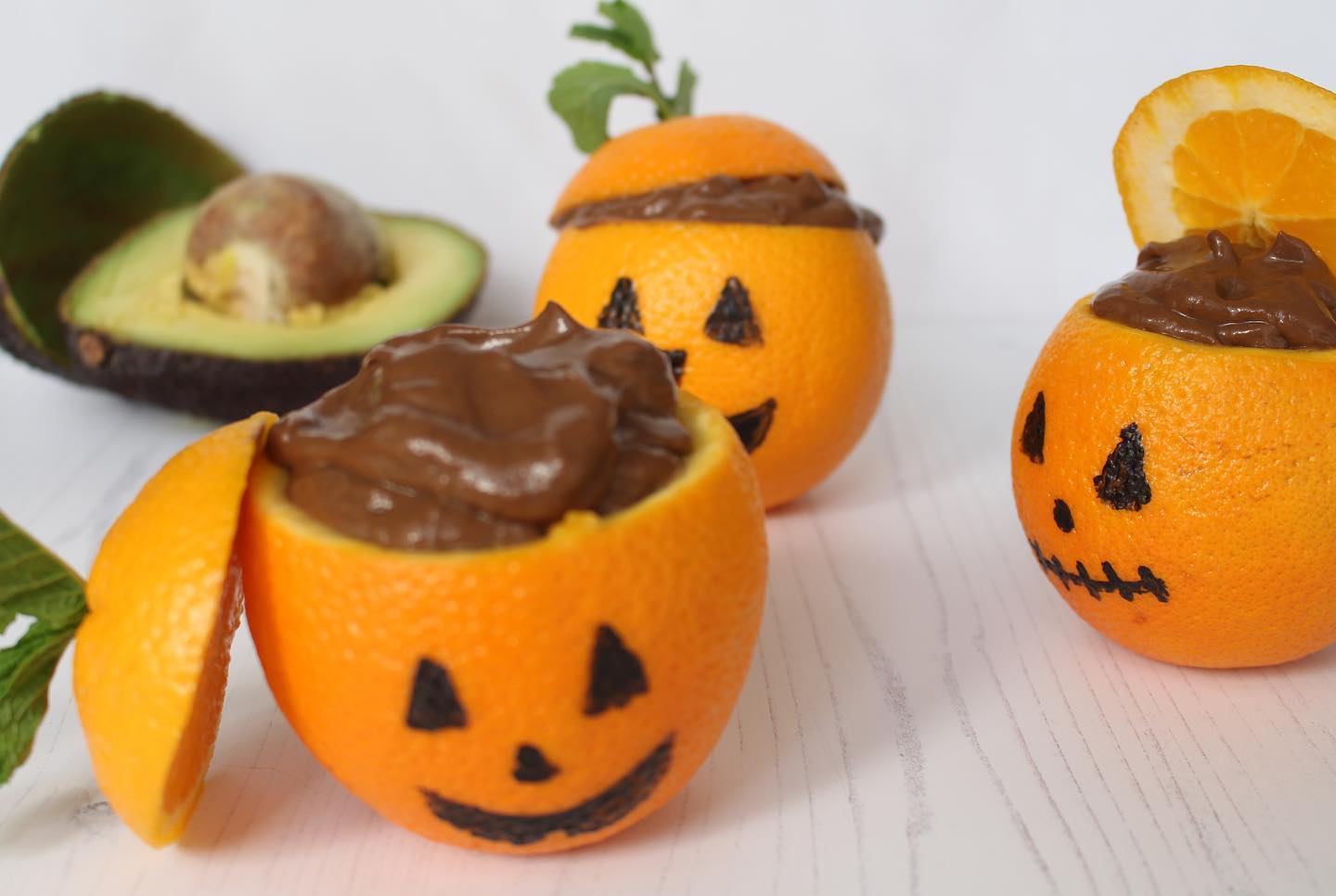 Avo-Choco-Banana Mousse in Orange Jack-O-Lanterns