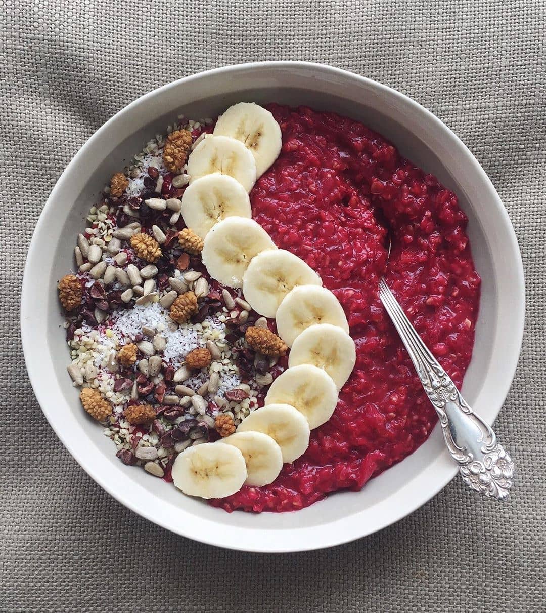 Vegan Beetroot Oat Porridge with Banana and Raspberries