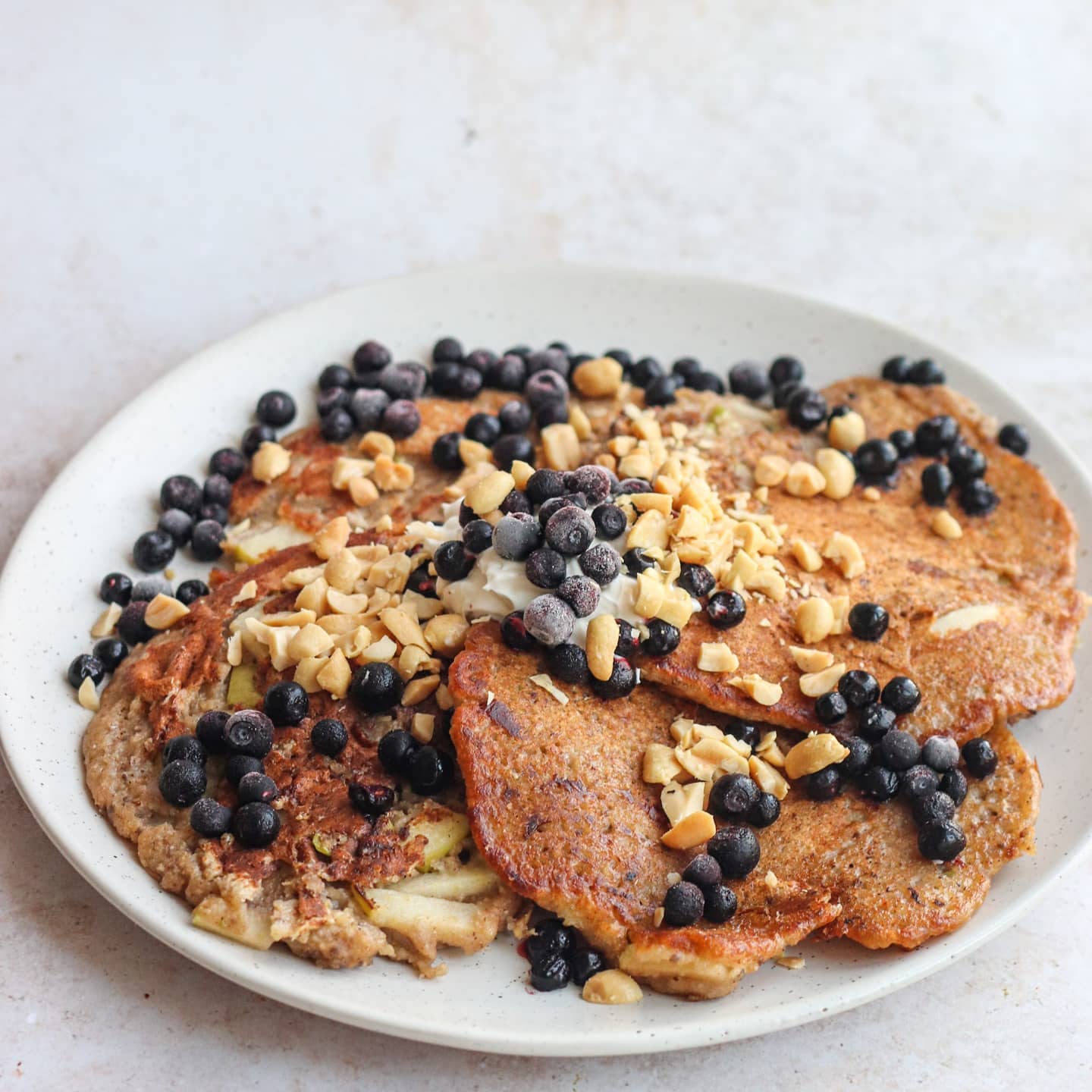 Vegan Pancakes with Banana, Berries, Chocolate, and Whipped Cream