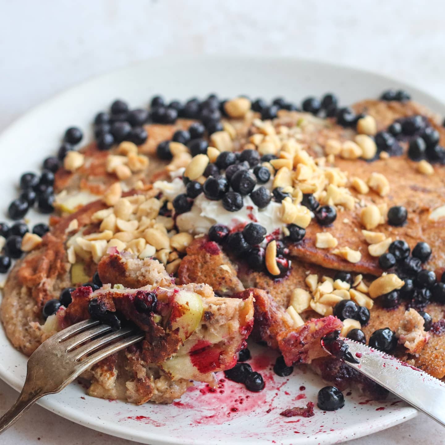 Vegan Pancakes with Banana, Berries, Chocolate, and Whipped Cream