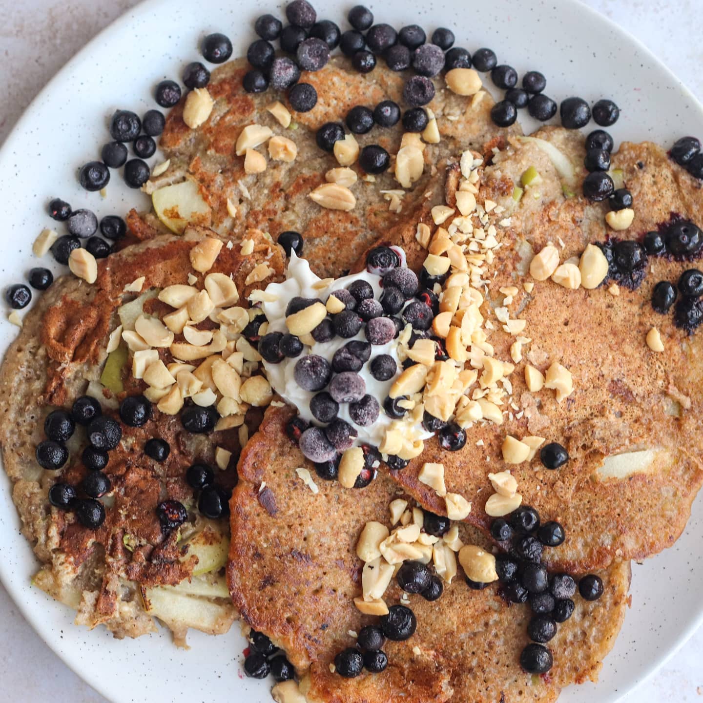 Vegan Pancakes with Banana, Berries, Chocolate, and Whipped Cream