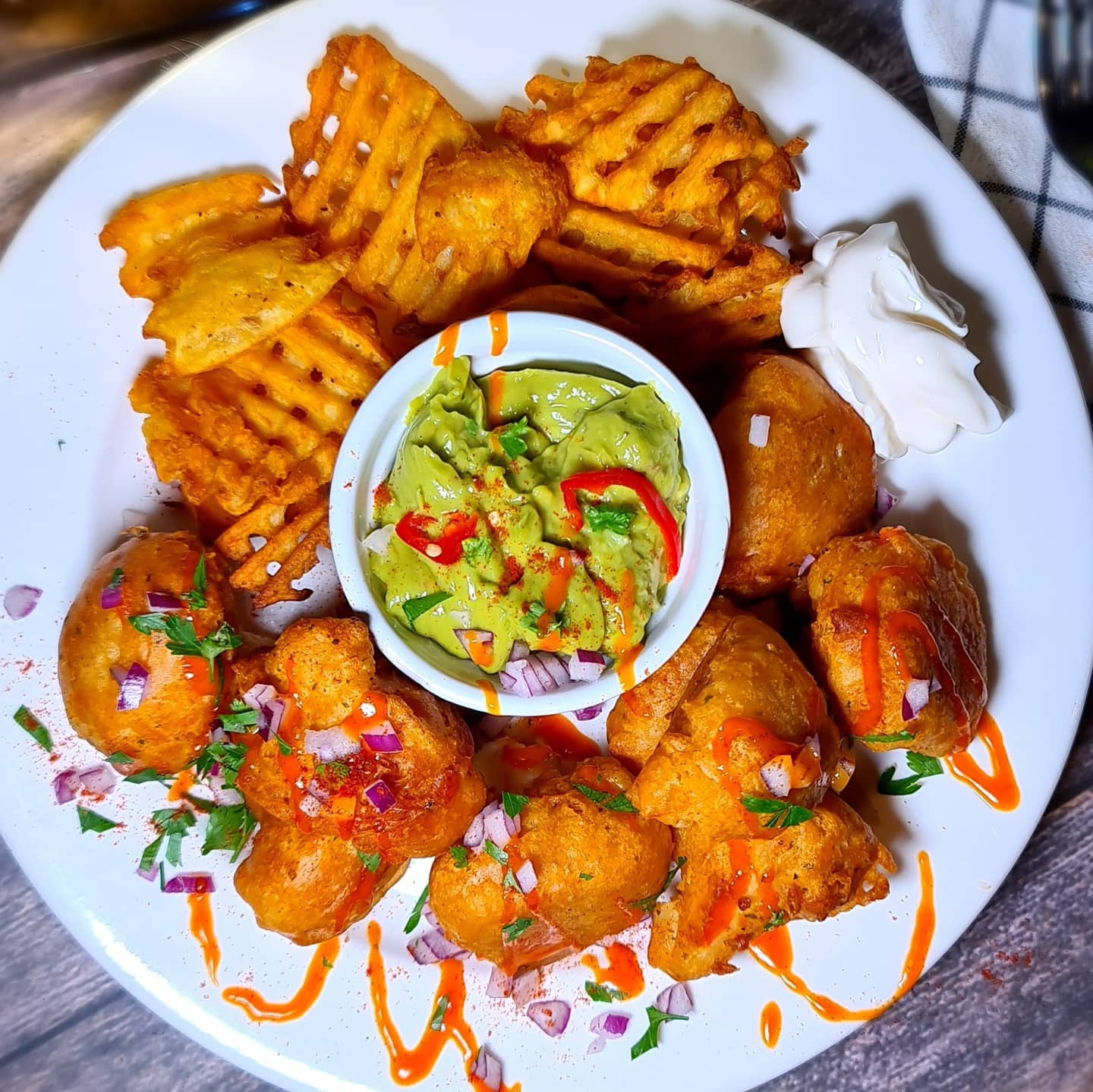 Cajun Cauliflower Wings with Guacamole