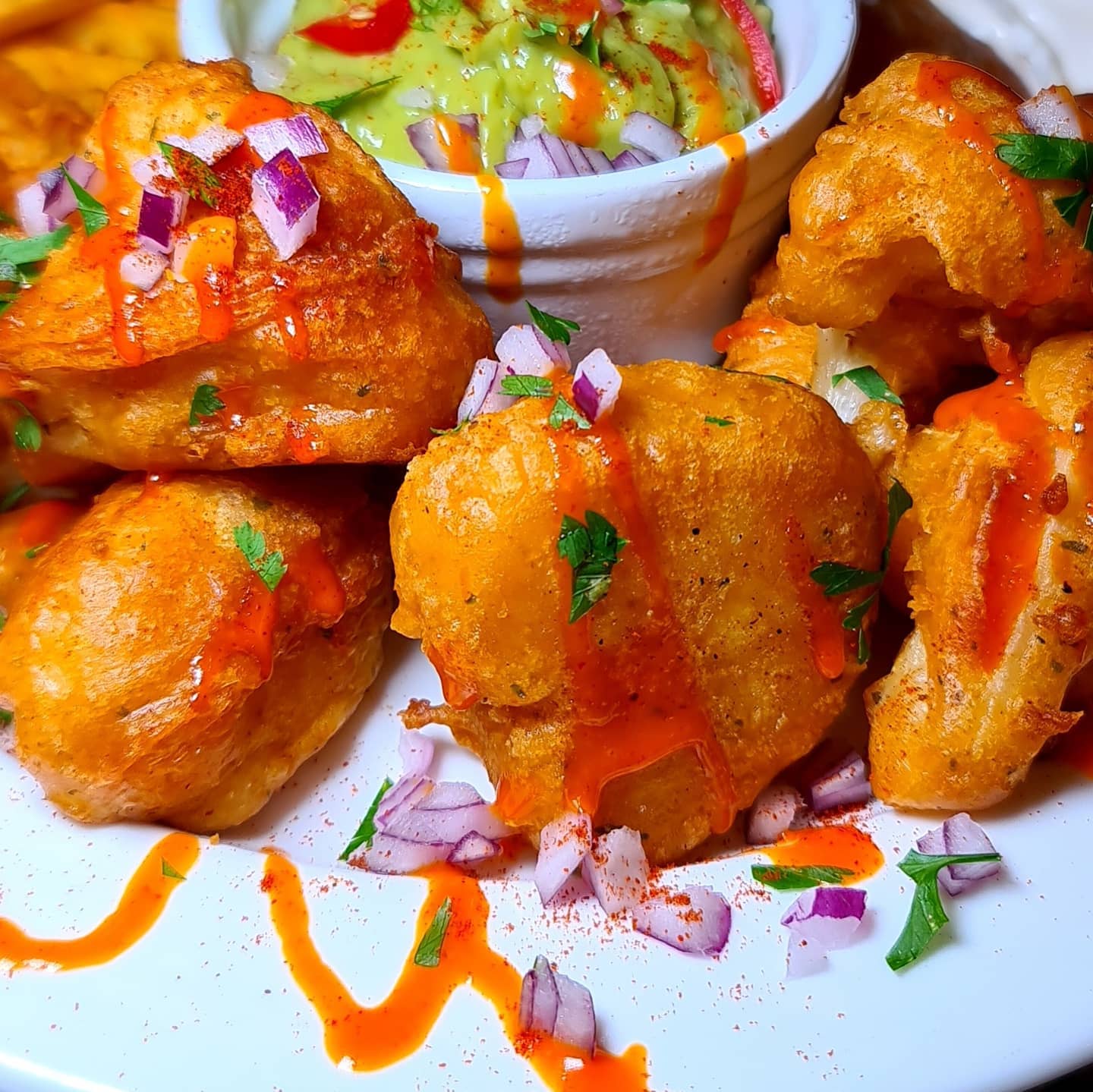 Cajun Cauliflower Wings with Guacamole