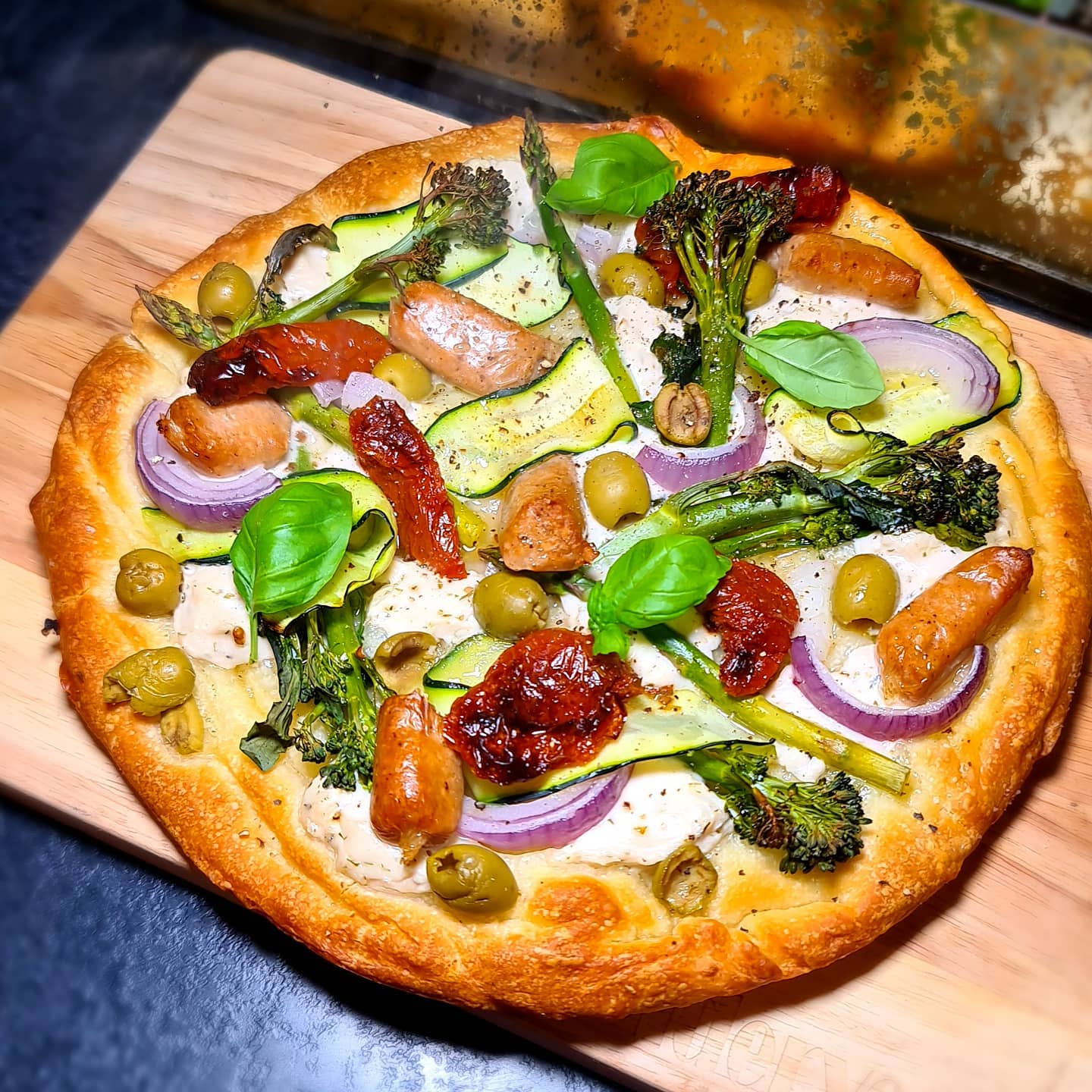 Vegetable and Sausage Topped Pizza