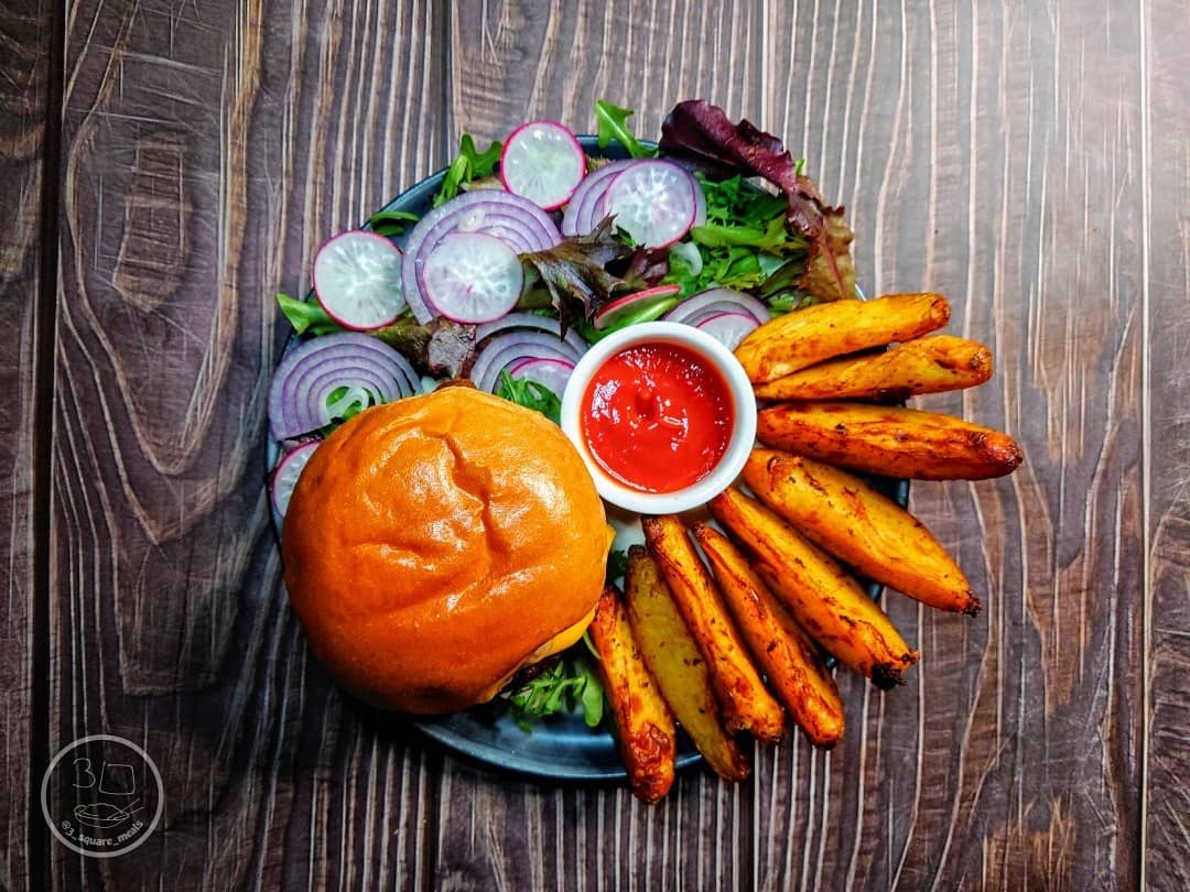 Quorn Quarter Pounder with Wedges and Caramelized Onions