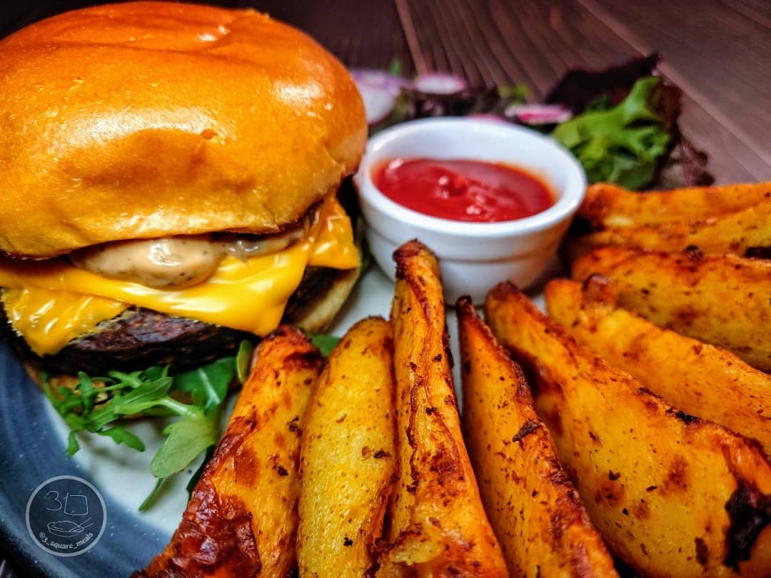 Quorn Quarter Pounder with Wedges and Caramelized Onions