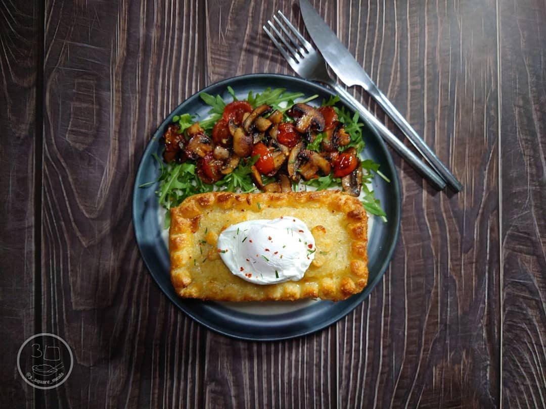 Breakfast Pie with Pasta Pastry, Sausages, Bacon, Beans, and Poached Egg