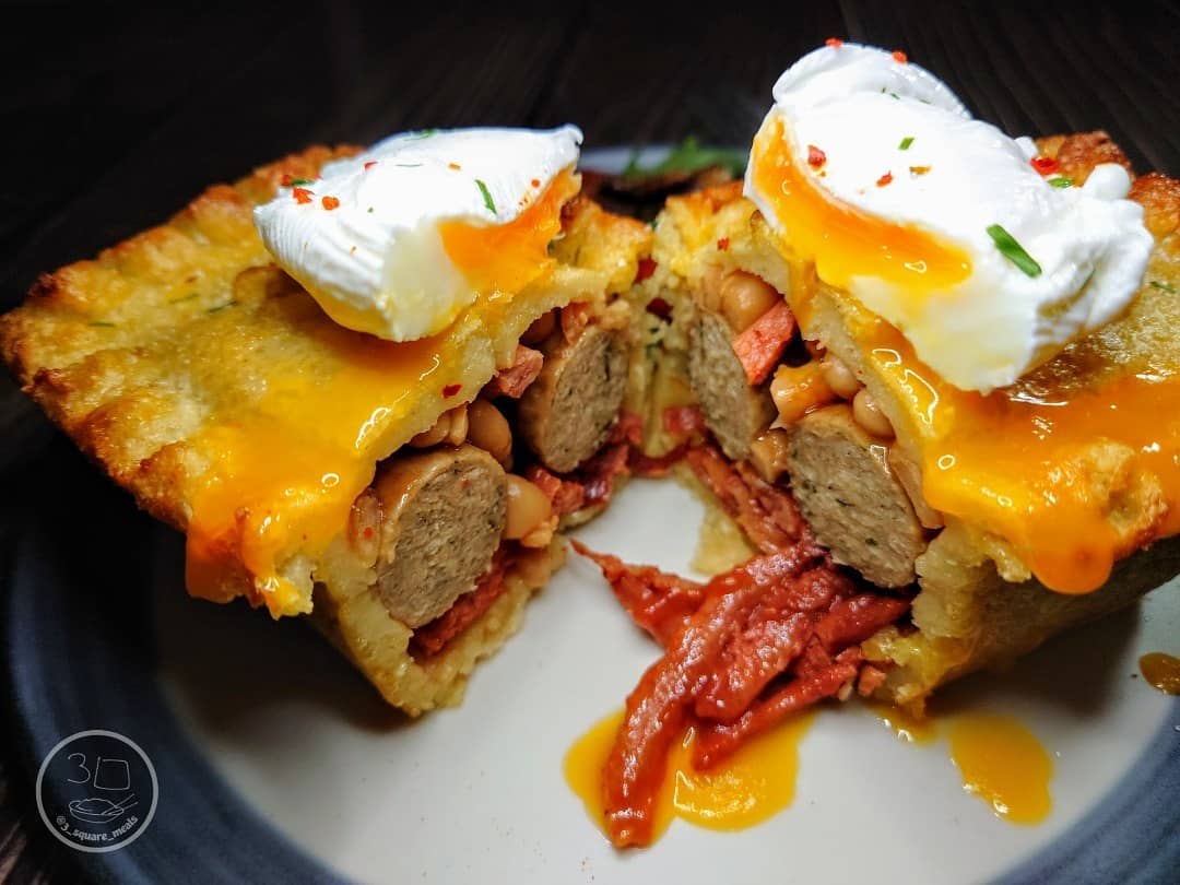 Breakfast Pie with Pasta Pastry, Sausages, Bacon, Beans, and Poached Egg