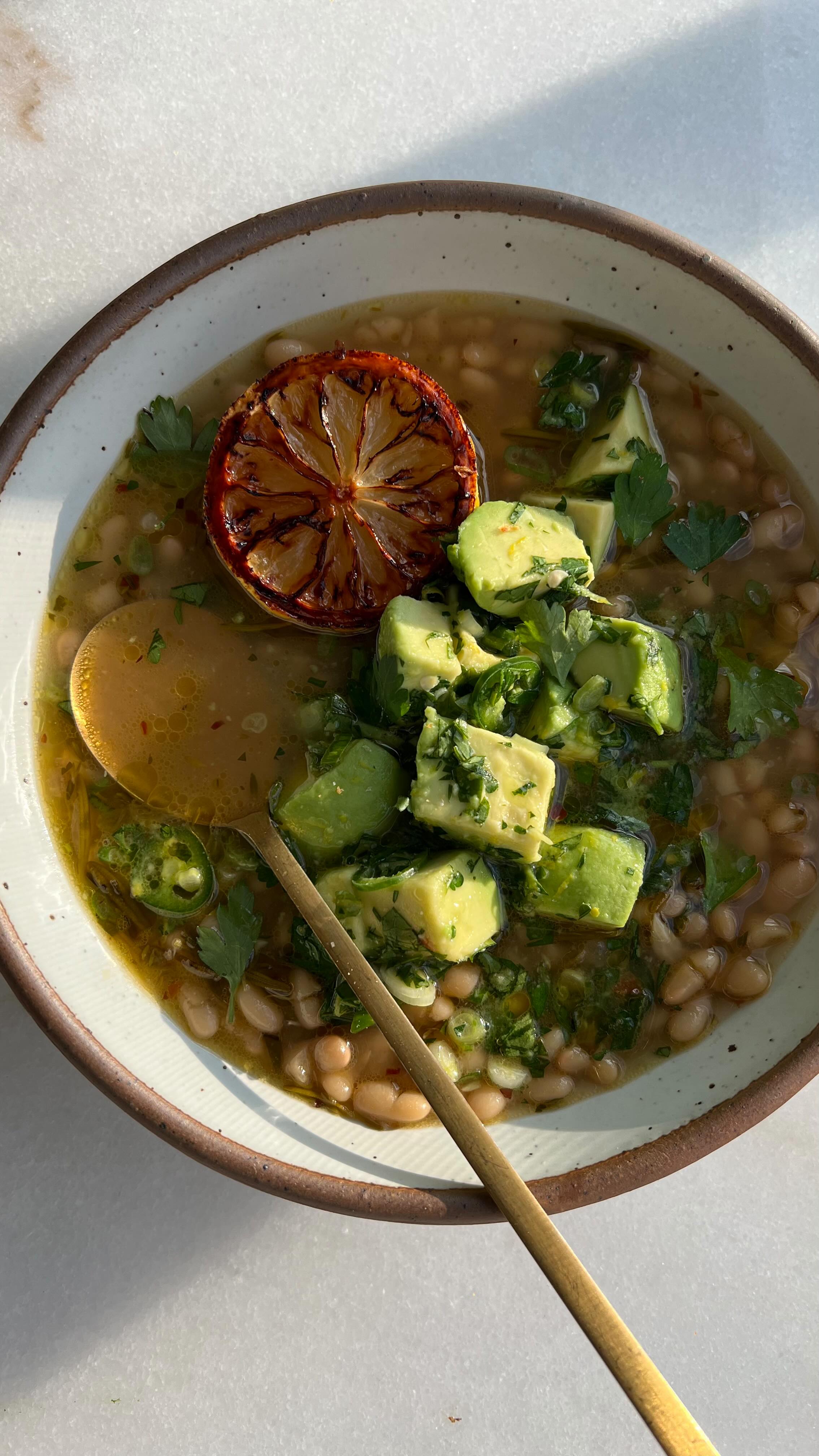 Charred Lemon Brothy Beans and Avocado Salsa