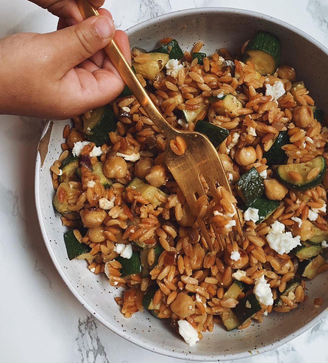 Legume Rice Dish with Zucchini, Onions, Garlic, Oregano, Paprika, Chickpeas, and Feta