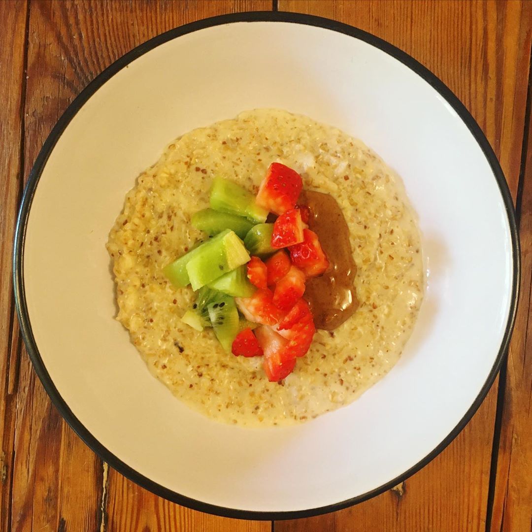 Ginger Infused Porridge with Nut Butter and Fruits