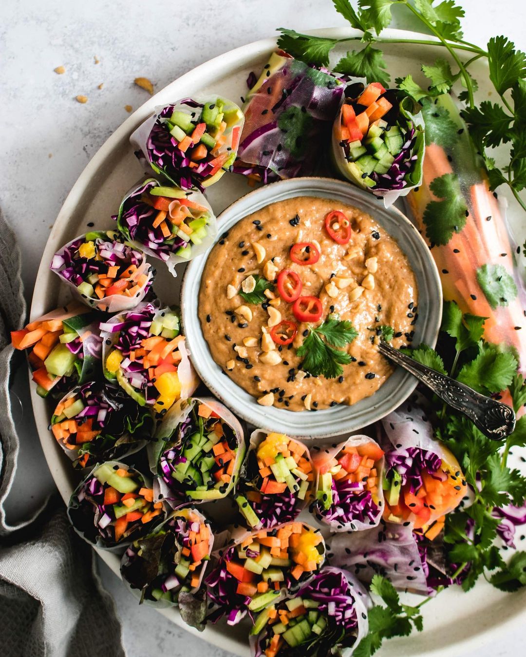 Summer Rolls Filled with Crunchy Rainbow Veggies and a Creamy Peanut Sauce