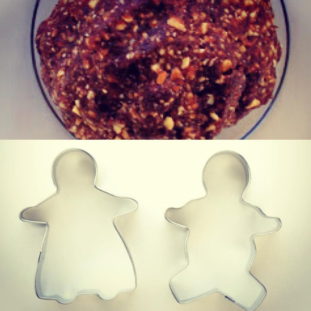 Raw Gingerbread Cookies Shaped as Balls or Figures