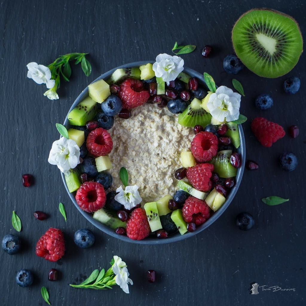 Healthy Oat Bowl with Fresh Fruits and Syrup