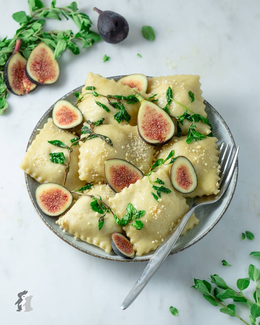 Tofu Ricotta and Butternut Squash Ravioli Rolled in Oregeno Browned Butter and Topped with Fresh Black Figs and Toasted Bread Crumbs