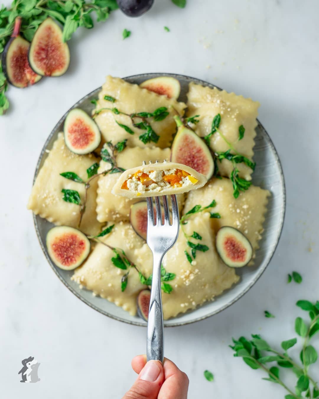 Tofu Ricotta and Butternut Squash Ravioli Rolled in Oregeno Browned Butter and Topped with Fresh Black Figs and Toasted Bread Crumbs