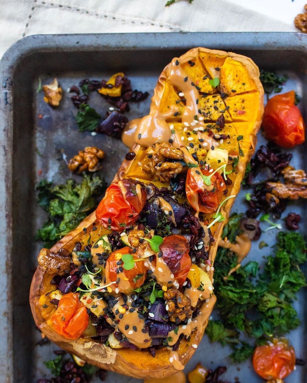 Wild Rice Stuffed Butternut Squash with Glazed Walnuts and Tahini Cream