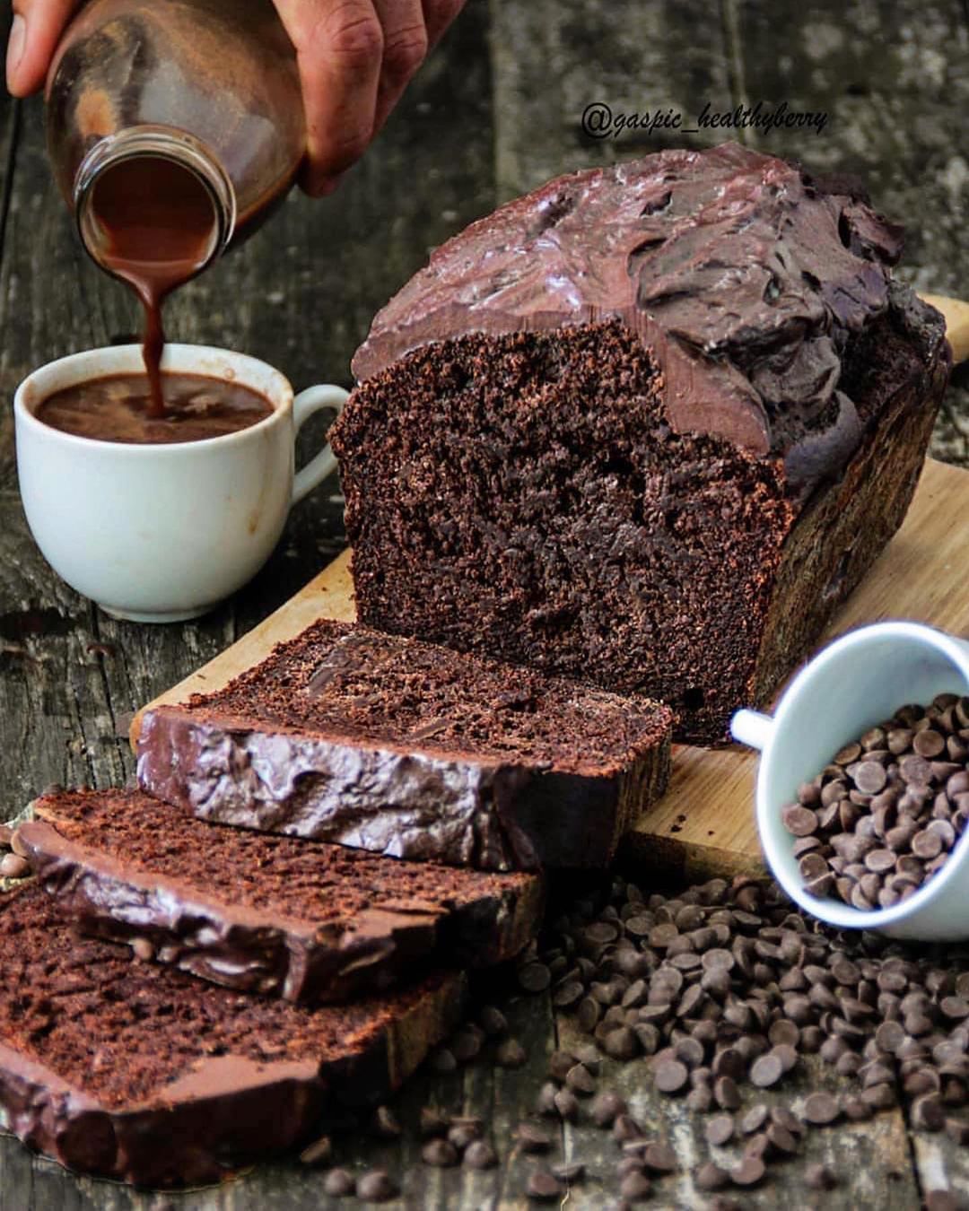 Vegan Flourless Triple Chocolate Cake Topped with Melted Chocolate Ganache