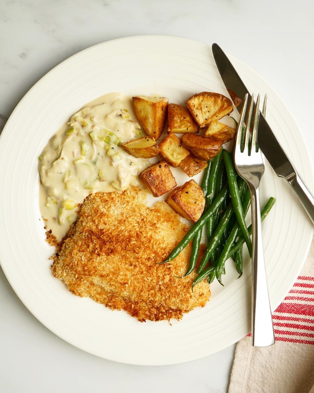 Smoked Fish with Creamy Leeks and Mini Roast Potatoes