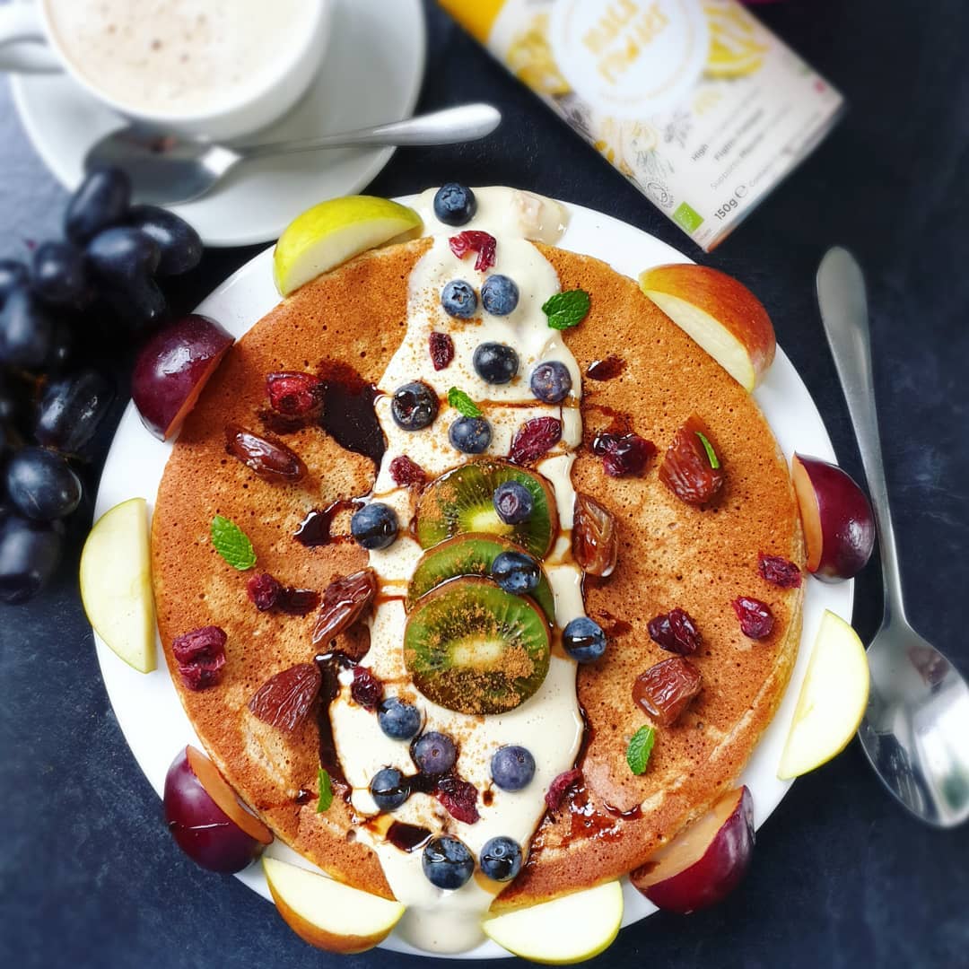 Giant Wholemeal Maca Pancake Topped with Mango Yoghurt (Sugar Free) & Fruits. + Drizzle of Date Nectar