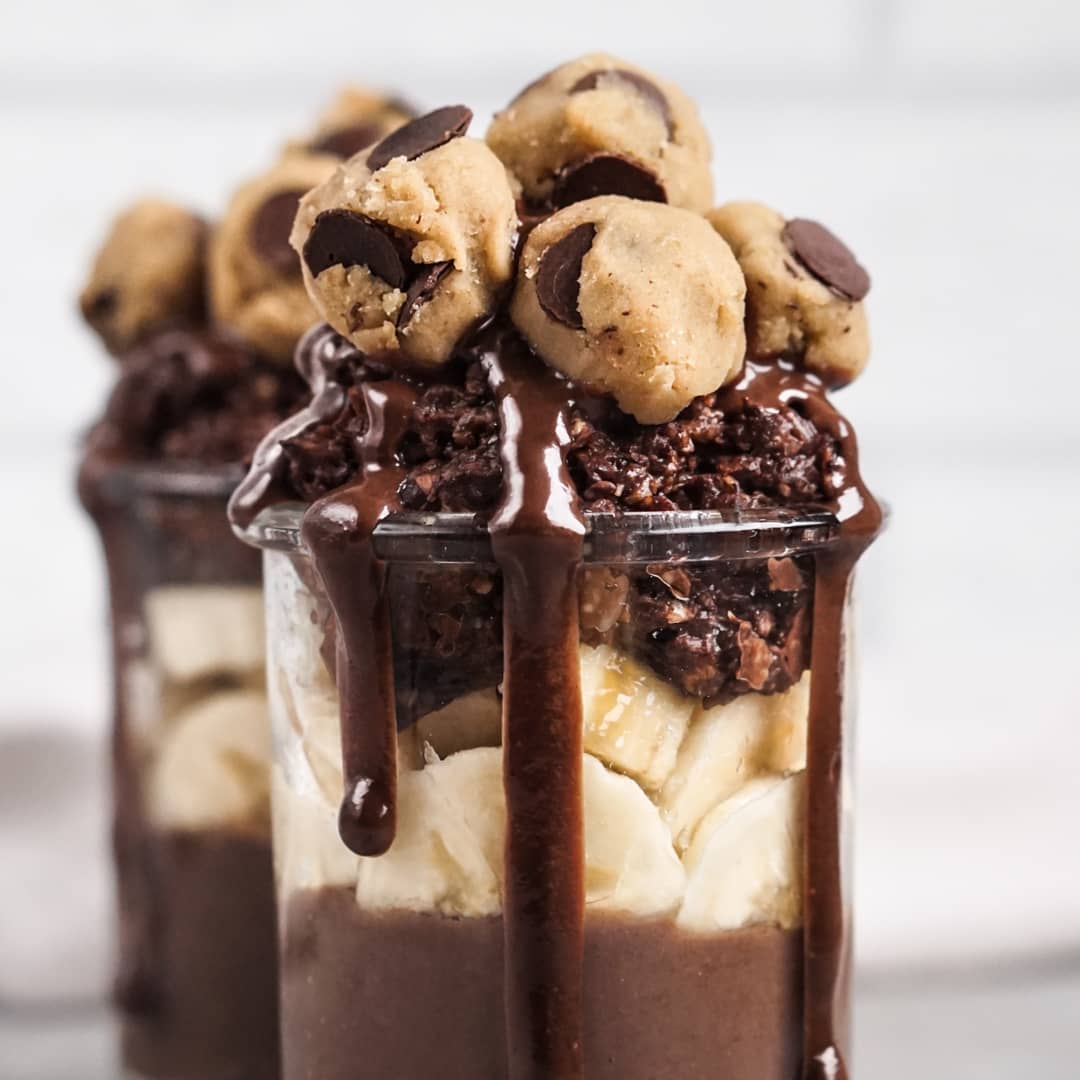 Jars with Chocolate Protein Pudding, Banana, Sticky Chocolate Oats, Tigernut Chocolate Cream and Healthy White Bean Cookie Dough