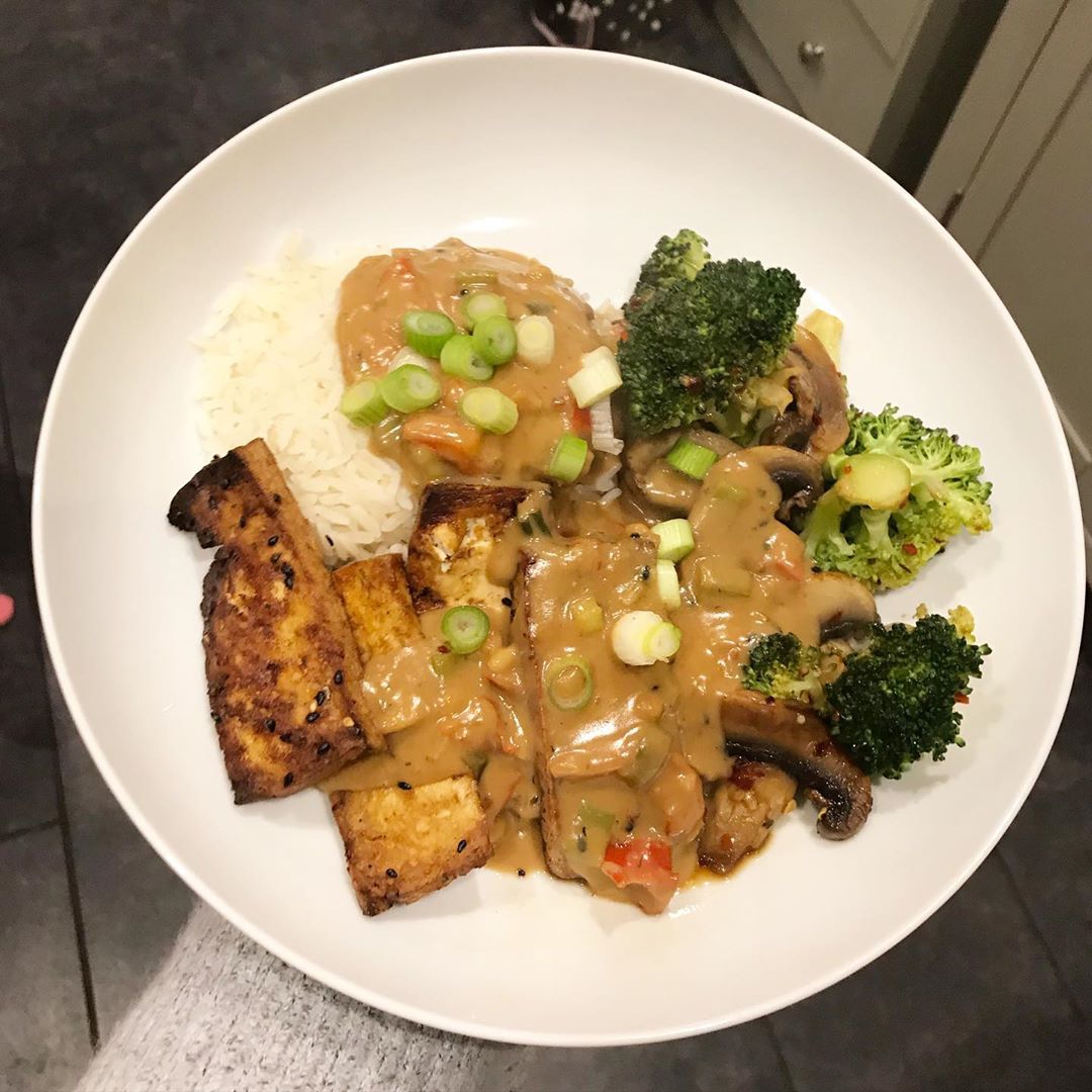 This Is Tofu Satay with Fried Greens and Rice