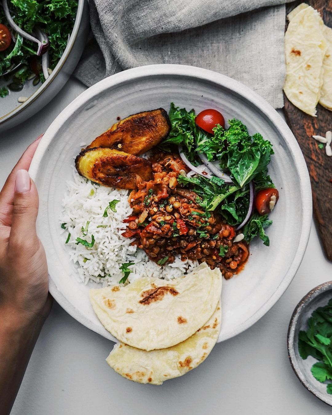 Red Pepper Scotch Stewed Lentils, Coconut Rice, Kale Salad, Fried Plantain